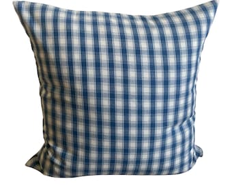 May include: A square pillow with a blue and white gingham pattern. The pillow has a soft, textured appearance and is filled to create a plump shape. The blue and white checkered design is evenly spaced across the fabric.