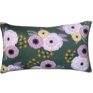 May include: A rectangular decorative pillow with a floral pattern. The pillow features a dark green background with a repeating pattern of pink, yellow, and purple flowers. The flowers have a detailed, textured appearance.