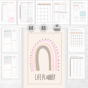 Op de afbeelding: Een printbare levensplanner met een regenboogontwerp. De planner bevat dagelijkse, wekelijkse en maandelijkse pagina's. De omslag toont een regenboog in de kleuren roze, oranje en bruin. De tekst "LIFE PLANNER" staat onder de regenboog.