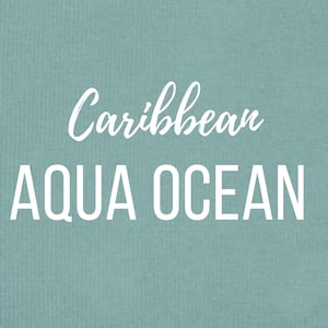 May include: A teal blue background with white text that reads "Caribbean Aqua Ocean".