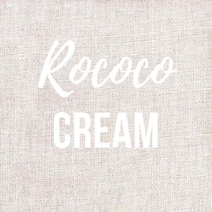Puede incluir: Texto blanco sobre un fondo de lino beige que dice "Rococo Cream".
