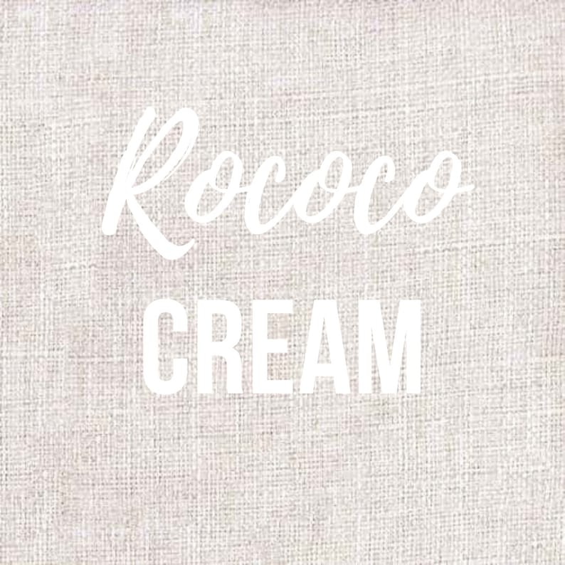 Puede incluir: Texto blanco sobre un fondo de lino beige que dice "Rococo Cream".