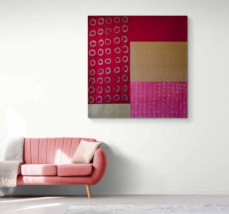 May include: Abstract art painting with a red background and a pattern of white circles. The painting is divided into three sections, with a gold section in the middle and a pink section at the bottom.