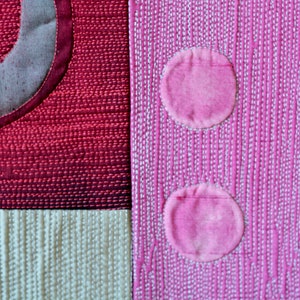 May include: A close-up of a pink fabric with white stitching, featuring three large pink circles. The fabric is textured and has a subtle sheen.