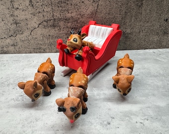 May include: A red sleigh with a white seat and a brown reindeer figurine inside. Four brown reindeer figurines are standing around the sleigh.
