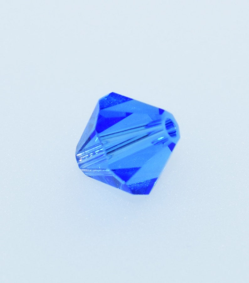 Swarovski Schliffspitzperle, 6mm Facettperle in verschiedenen Farben, Glasperlen, Glasschliffperlen zur Schmuckherstellung, 12 St. sapphire