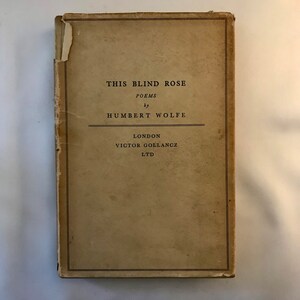 May include: A vintage book cover with the title "This Blind Rose" by Humbert Wolfe. The book was published in London by Victor Gollancz LTD.