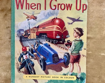 Könnte beinhalten: Ein altes Kinderbuch mit dem Titel "When I Grow Up" mit einer bunten Illustration eines Jungen, eines Zuges, eines Autos, eines Motorrads und eines Hubschraubers. Das Buch ist ein Bilderbuch für Kinder in Farbe.