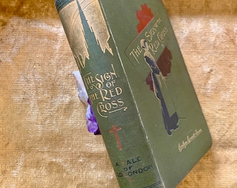 Un libro victoriano antiguo de 1899, primera edición: El signo de la Cruz Roja