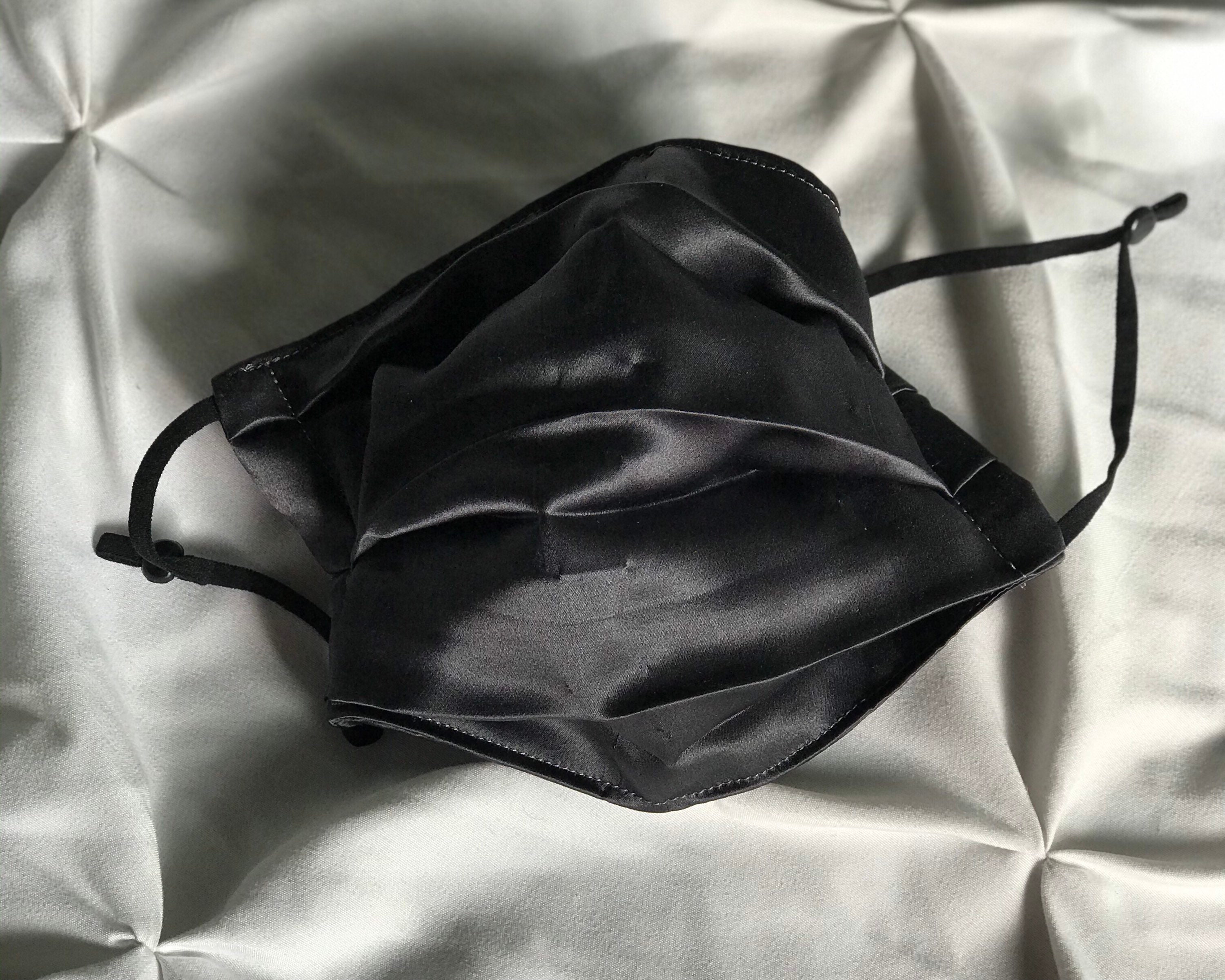Silk mask has three layers and adjustable straps. Etsy