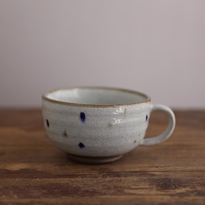 Japanese handmade beige blue dotted glazed ceramic mug for tea coffee and latte