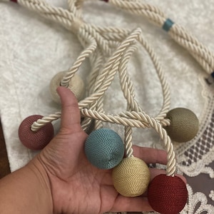 Egyptian Handmade curtain tieback tassel. Eight balls in one tieback.