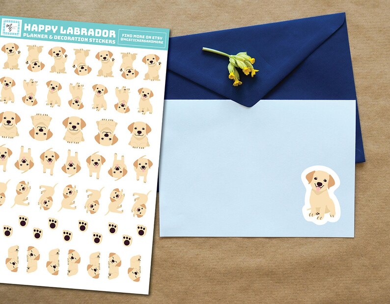 May include: A sheet of planner and decoration stickers featuring a variety of adorable yellow Labrador Retriever illustrations. The stickers are perfect for adding a touch of whimsy to your planner, journal, or other creative projects. The sheet includes a variety of poses, including sitting, standing, and playing. The text "HAPPY LABRADOR PLANNER & DECORATION STICKERS" is printed at the top of the sheet.