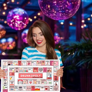May include: A woman holds up a pink and white board game called "DrunkoPoly:  The Alcoholic Party". The game board has squares with different drinking game challenges.