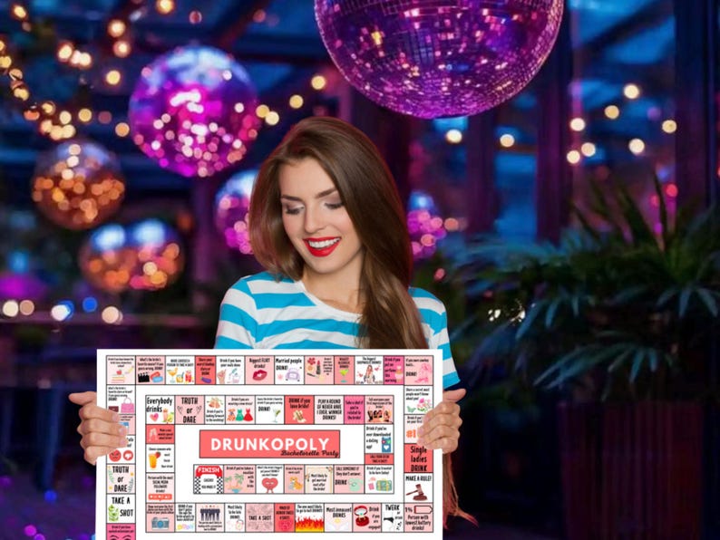 May include: A woman holds up a pink and white board game called "DrunkoPoly:  The Alcoholic Party". The game board has squares with different drinking game challenges.