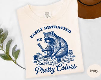 Art Teacher Shirt, Comfort Colors Raccoon Art Lover tshirt, Women Art Educator Apparel, Gift for Creative , Arts and Crafts Shirt