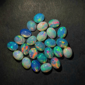 50 Pieces 7X9 MM Natural Ethiopian Opal Cabochon, AAA Opal Cabochon~  Oval Opal Cabochon Calibrated Size~ Opal Loose Stone~ Oval Gemstone.
