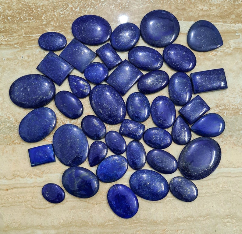 500 CT TOP GRADE NATURAL LAPIS LAZULI WHOLESALE LOT CABOCHON UNTREATED GEMSTONES 500 CT TOP GRADE NATURAL LAPIS LAZULI WHOLESALE LOT CABOCHON UNTREATED GEMSTONES