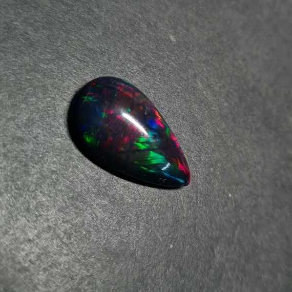 Black opal sales cabochon