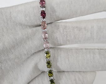 Pulseira de tênis com turmalinas múltiplas, prata de lei 925, gema oval.