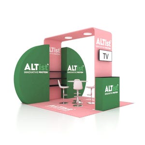May include: A pink and green trade show booth with the text "ALTist INNOVATIVE PROTEIN" displayed on multiple surfaces. The booth features a small table, three bar stools, and a TV screen. The booth is set on a pink floor.