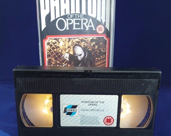 Phantom of the Opera VHS nightlight in warm yellow