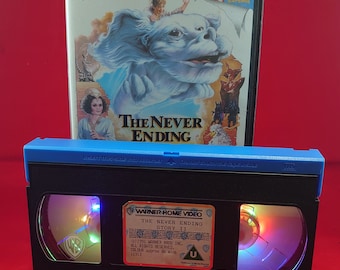 VHS nightlight of The Never Ending Story 2 in multi coloured lights.