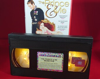 VHS night light of The Prince & Me in warm yellow