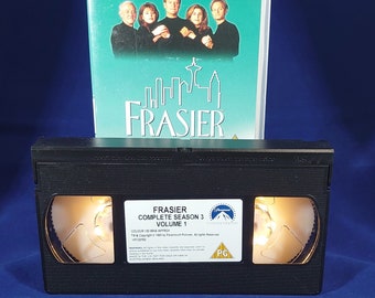 Frasier season 3 tape 1 VHS nightlight in warm yellow.