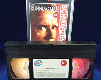 Running man VHS nightlight in yellow and red Arnold Schwarzenegger