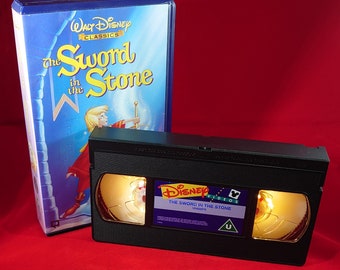 Sword in the Stone Disney VHS nightlight in warm yellow