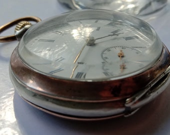 Normale. Antique, silver, pocket watch. Cylinder movement. Side pin time adjustment. Working. Running fast.