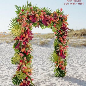 Elegante arco d'ingresso floreale con idee per archi nuziali tropicali per cerimonie in ispirazione per matrimoni in paradiso foglie di palma arancio rosa acceso rosa