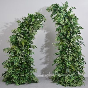 Foliage Broken arch Flower Arrangement full Greenery Wedding Arch Floral Arrangement for Horn Arch of Green mixed leaves.