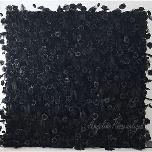 May include: A black backdrop made of artificial roses and feathers. The backdrop is a popular choice for weddings, parties, and photo shoots. The text "Angelina Personalized" is visible in the bottom right corner.