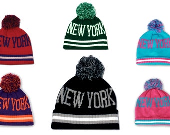 champion toque with pom pom