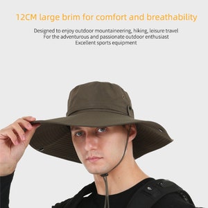 May include: A khaki green sun hat with a wide brim and a drawstring. The hat has a 12 cm brim for comfort and breathability. It is designed for outdoor activities like hiking and mountaineering.
