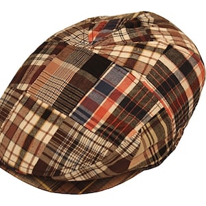 May include: A brown, black, and red plaid newsboy cap with a patchwork design.