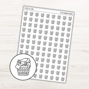 May include: Sheet of stickers featuring a repeating pattern of laundry basket doodles. Each basket is filled with clothes. A larger, circular image of a laundry basket is in the lower left corner. The text "Sticker Lovin" is at the top left, and "D-39 Laundry Doodle" is at the top right.