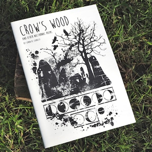 Opuscolo di poesia di legno di corvo
