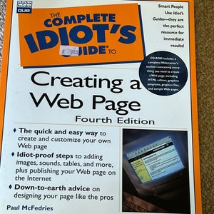 May include: The Complete Idiot's Guide to Creating a Web Page, Fourth Edition book cover with an orange background and a computer monitor image. The book title is in large, bold, white letters. The subtitle is in smaller, white letters. The book cover also includes a price tag of $9.95.