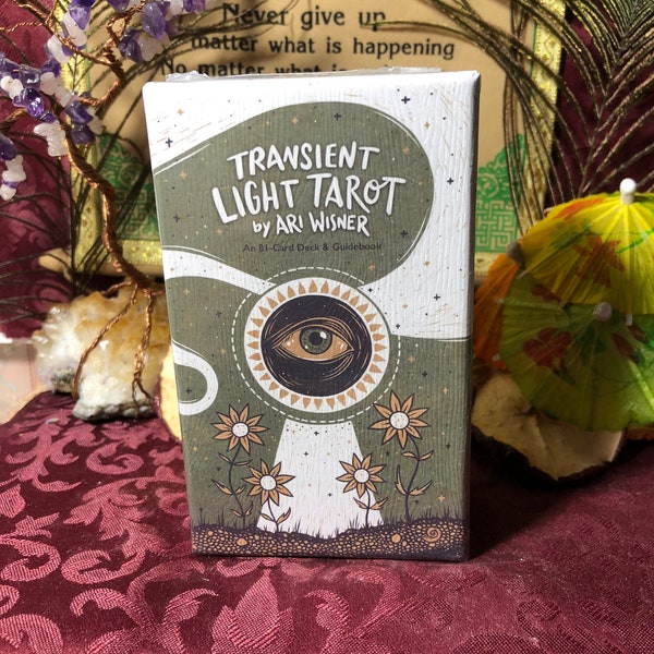 Transient Light Tarot by Ari Wisner is an 81 card deck with guidebook. Discover your own wisdom for healing & authenticity.