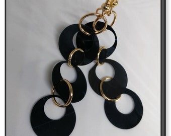 Design earrings made with recycled x-ray radiography materials