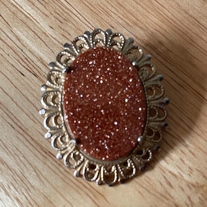 Vintage Goldstone Pin Brooch copper set in gold tone Victorian style setting
