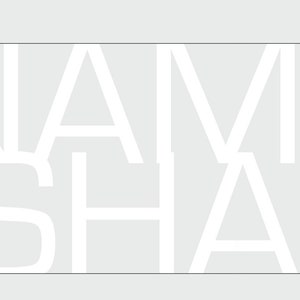 May include: White text on a light gray background spelling out the name "Jamie Shaf"