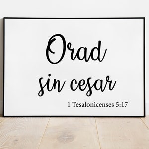 Puede incluir: Impresión enmarcada en blanco y negro con el texto "Orad sin cesar" y la referencia bíblica "1 Tesalonicenses 5:17".