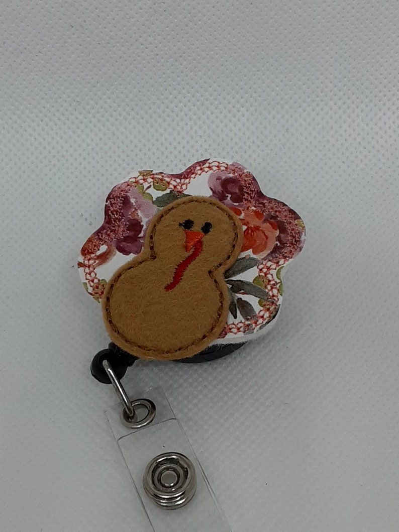 Turkey with Floral Feathers Badge Reel