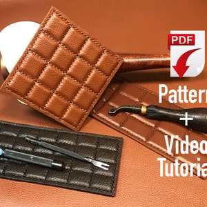 May include: Two leather squares with a quilted pattern, one brown and one black, with leather working tools on top. The text "Pattern + Video Tutorial" is written below the squares. A PDF download icon is in the upper right corner.