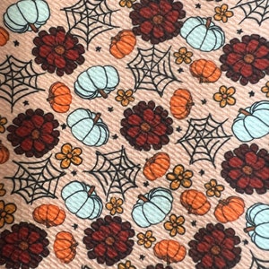 Half Yard of Pumpkins and Webs Printed Bullet Textured Liverpool Fabric | Half Yard 18” x 54” | Cuts are NOT continuous.