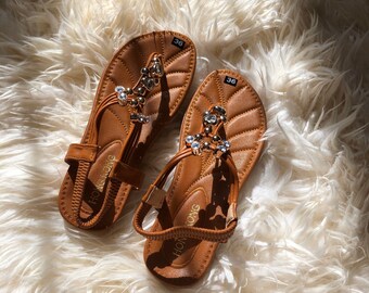 neutral colored flip flops